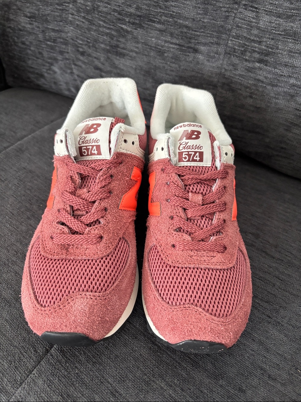 New Balance 574 Sneakers in Rose Pink with Coral Accents
